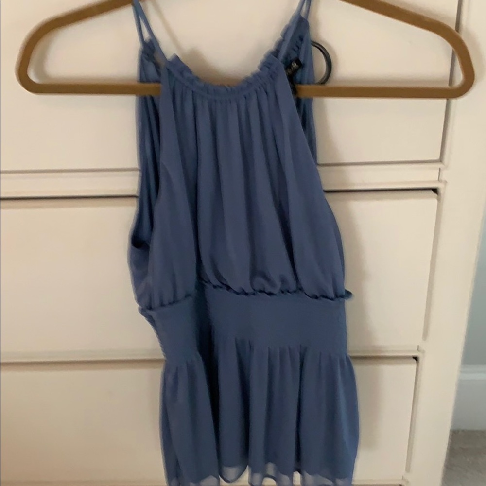Blue sleeveless blouse